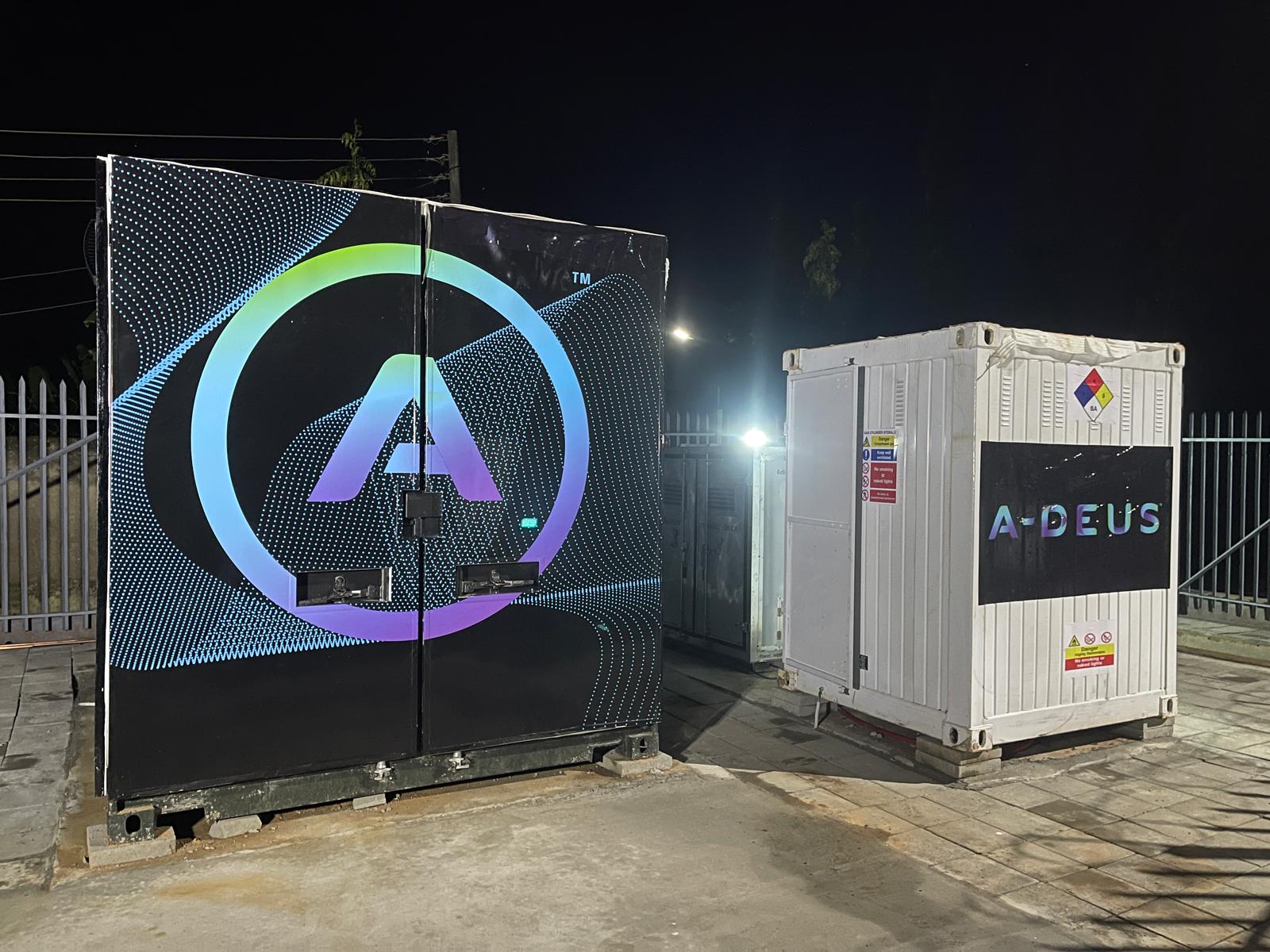 Power Angel and supporting equipment operating at night at the Abuja commercial showcase site.